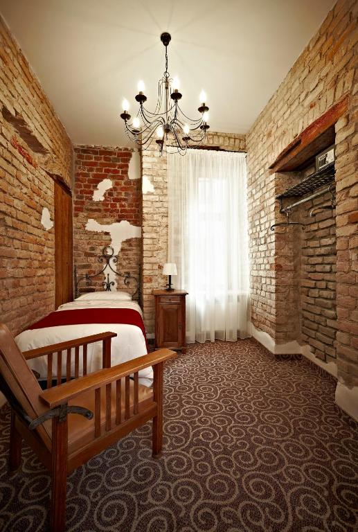 Postel nebo postele na pokoji v ubytování Boutique Hotel Justus