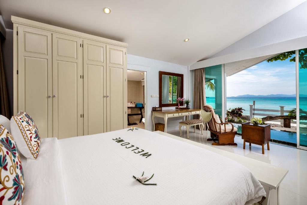 Postel nebo postele na pokoji v ubytování Racha Island Resort (Rayaburi)