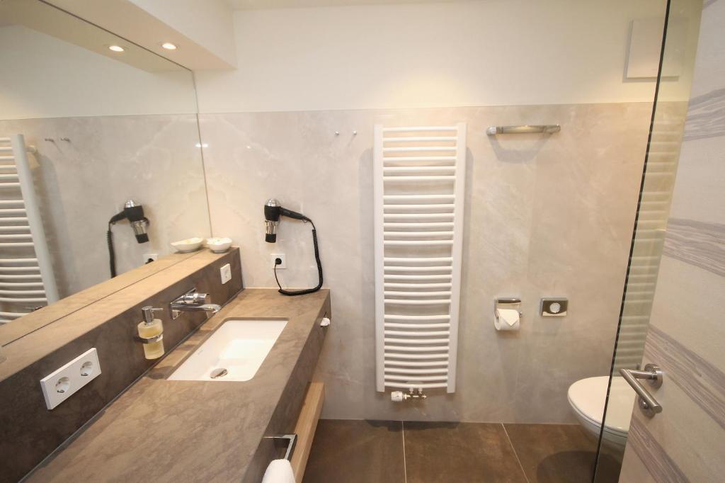Koupelna v ubytování Wohlfühlhotel Bercher