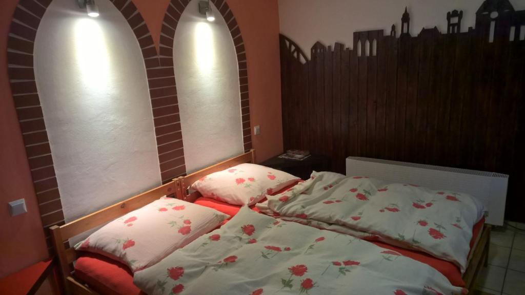Postel nebo postele na pokoji v ubytování Apartament na Wrzosach