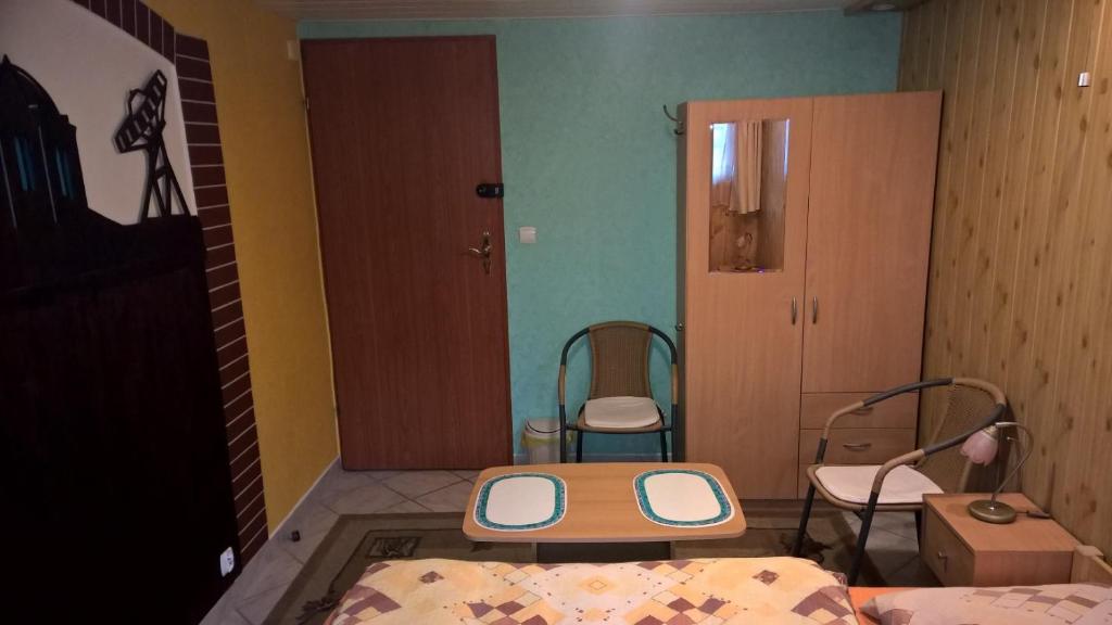 Postel nebo postele na pokoji v ubytování Apartament na Wrzosach