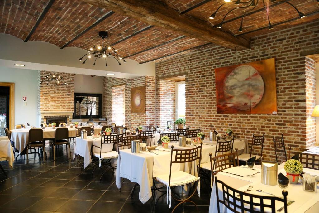 Restaurace v ubytování Aparthotel Le Manoir du Capitaine
