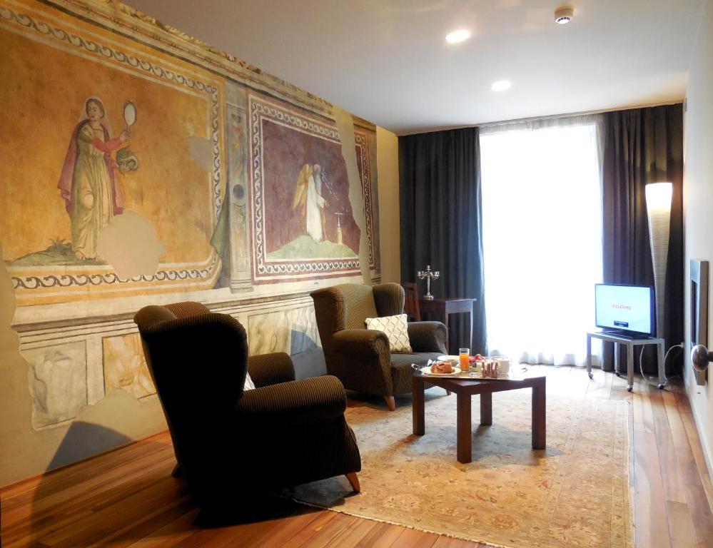 Posezení v ubytování Palazzo Ai Capitani