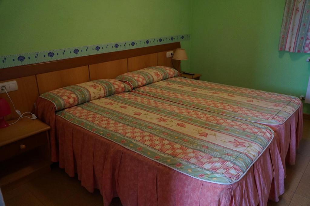Posteľ alebo postele v izbe v ubytovaní Hostal Camino Real