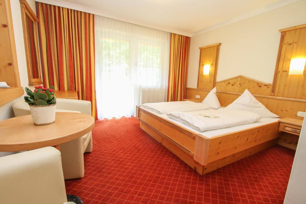Posteľ alebo postele v izbe v ubytovaní Landhotel Oberdanner