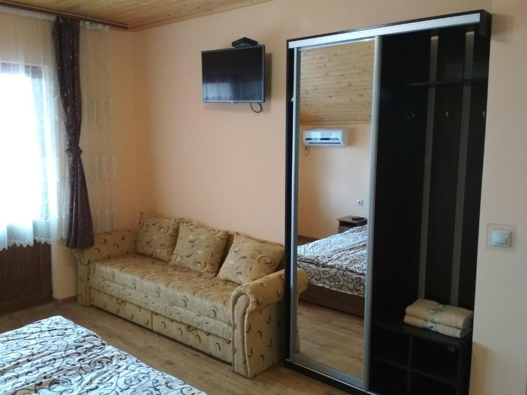 Postel nebo postele na pokoji v ubytování Котедж Silvia