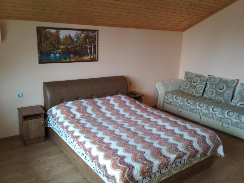 Postel nebo postele na pokoji v ubytování Котедж Silvia
