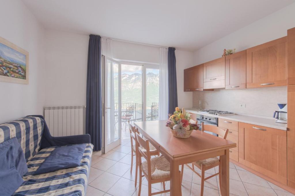 Kuchyň nebo kuchyňský kout v ubytování Village Hotel Lucia