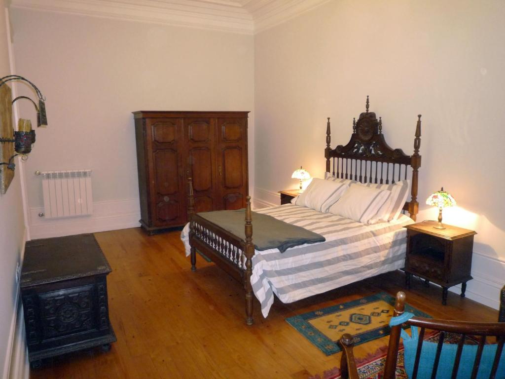 Postel nebo postele na pokoji v ubytování Casa Familiar do Porto