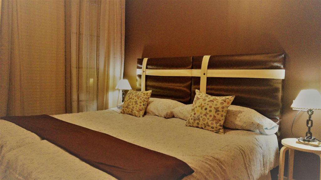 Postel nebo postele na pokoji v ubytování Hospederia V Centenario
