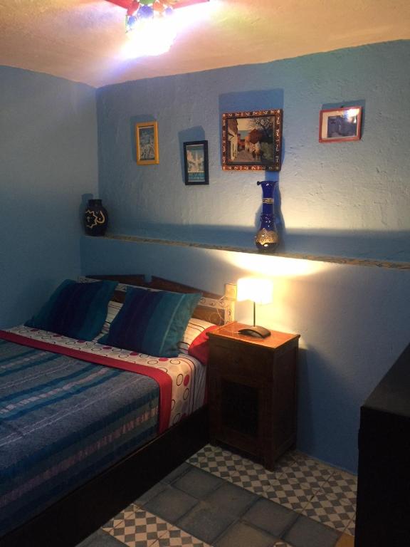 Llit o llits en una habitació de Dar Antonio