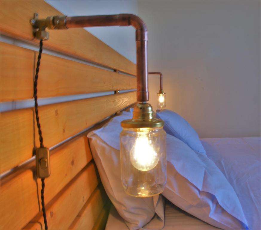 Postel nebo postele na pokoji v ubytování Kiveri Gems Houses