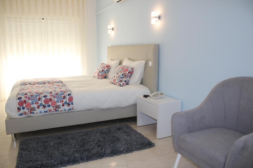 Cama ou camas em um quarto em Hotel Ancora Mar