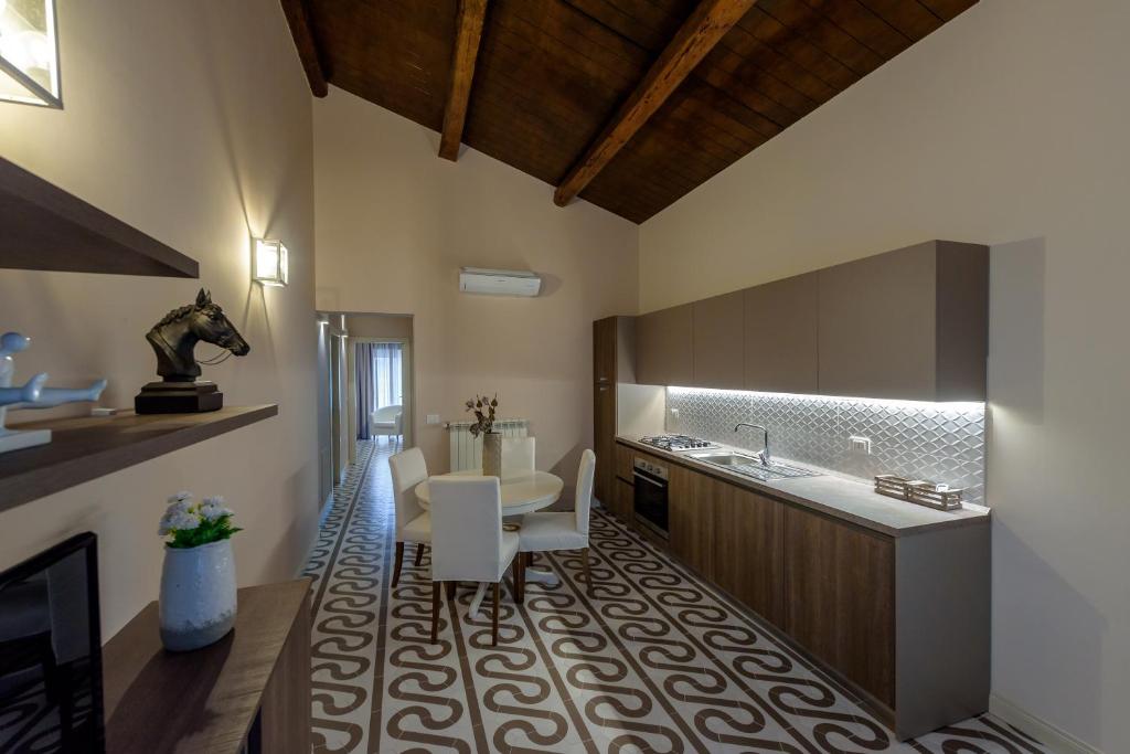 Kuchyň nebo kuchyňský kout v ubytování Marie Claire Apartments & Spa