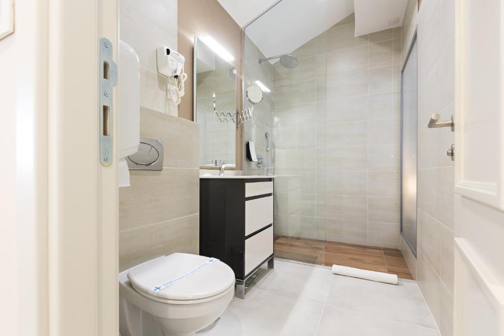 Koupelna v ubytování Marquise Hotel Garni