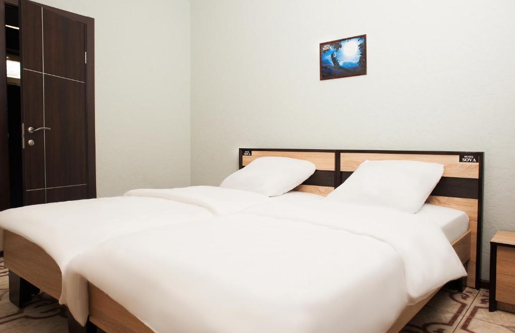 Postel nebo postele na pokoji v ubytování Sova
