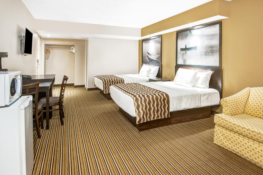 A television and/or entertainment centre at red maple inn and suites