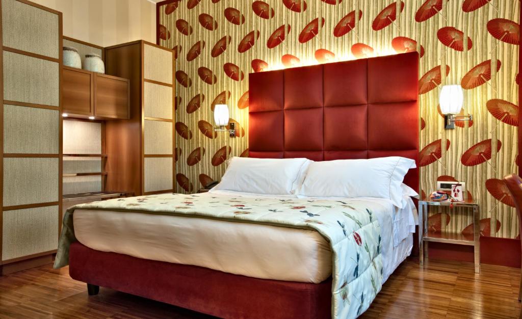 Postel nebo postele na pokoji v ubytování Enterprise Hotel Design & Boutique