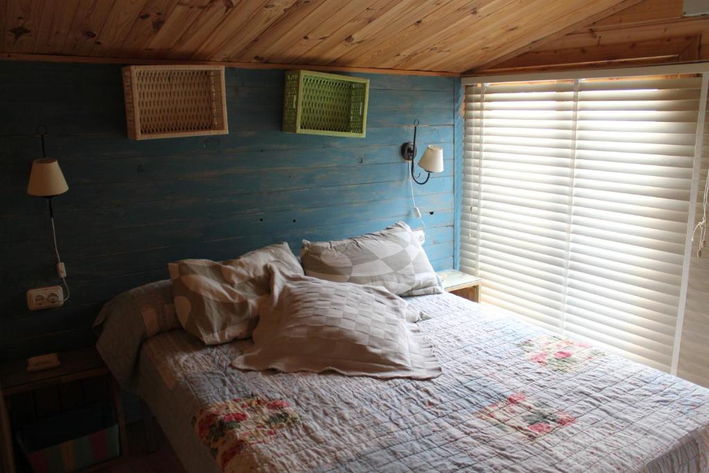Postel nebo postele na pokoji v ubytování Camping Riba-roja