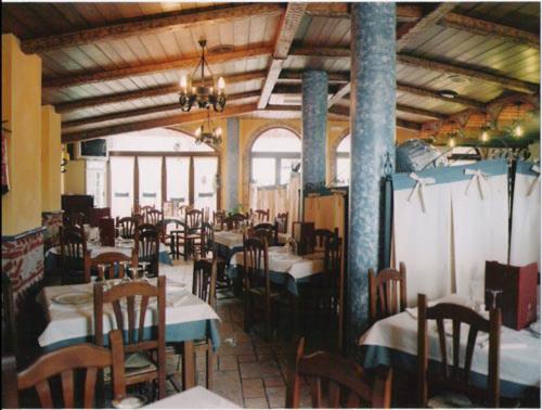 Restaurace v ubytování Apartamentos Raisa