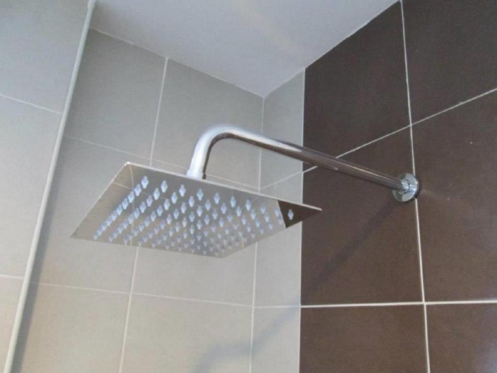 Koupelna v ubytování Oscar Suites Hotel