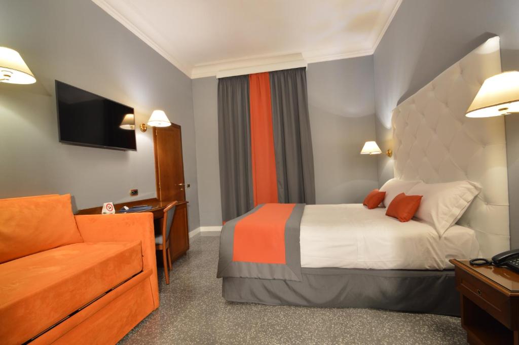 Postel nebo postele na pokoji v ubytování Hotel Montecarlo