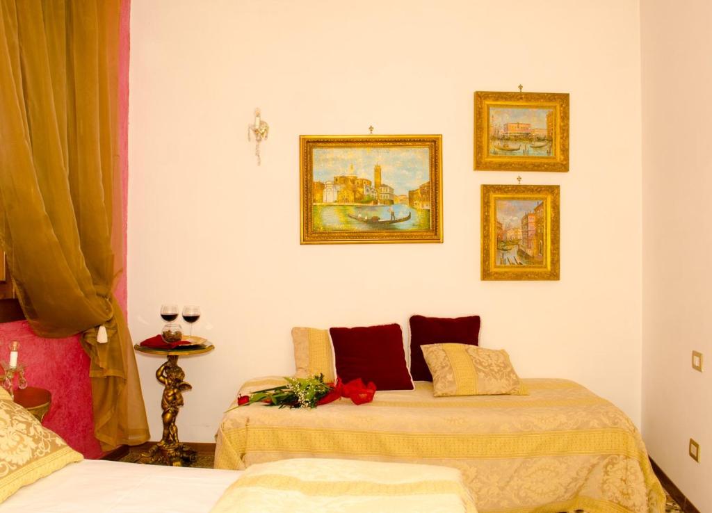 Postel nebo postele na pokoji v ubytování Relais Alcova del Doge