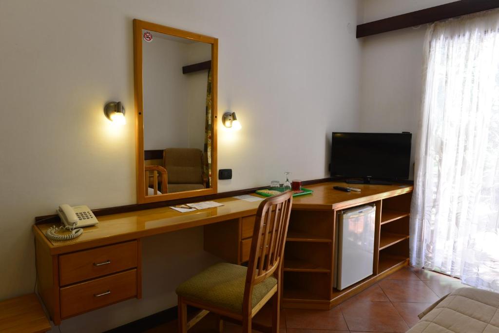 TV o dispositivi per l'intrattenimento presso Hotel Restaurant Papillon