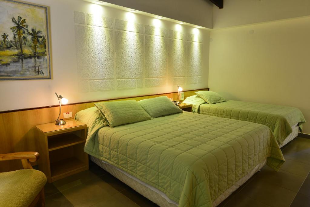 Letto o letti in una camera di Hotel Restaurant Papillon