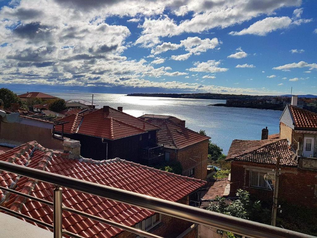 a view of the water and roofs of buildings at Drava 3 in Sozopol