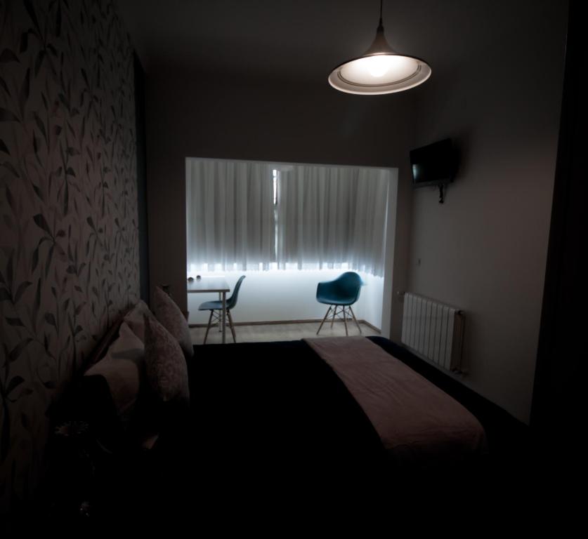 Postel nebo postele na pokoji v ubytování Quarto Crescente
