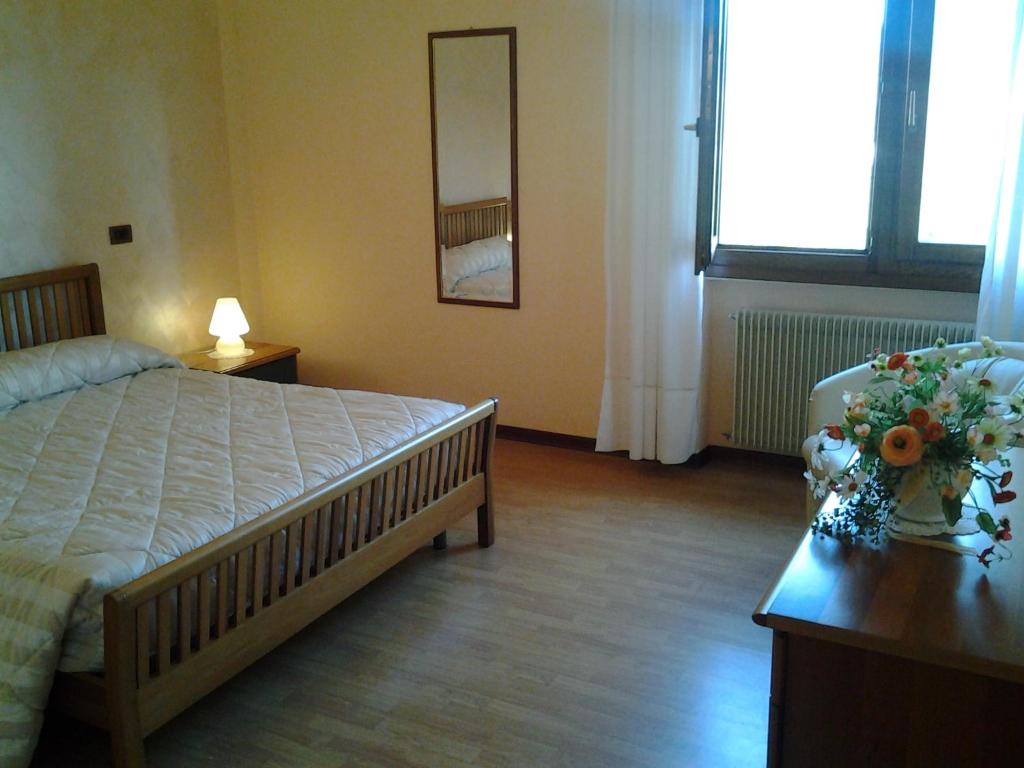 Postel nebo postele na pokoji v ubytování B&B La Palanca