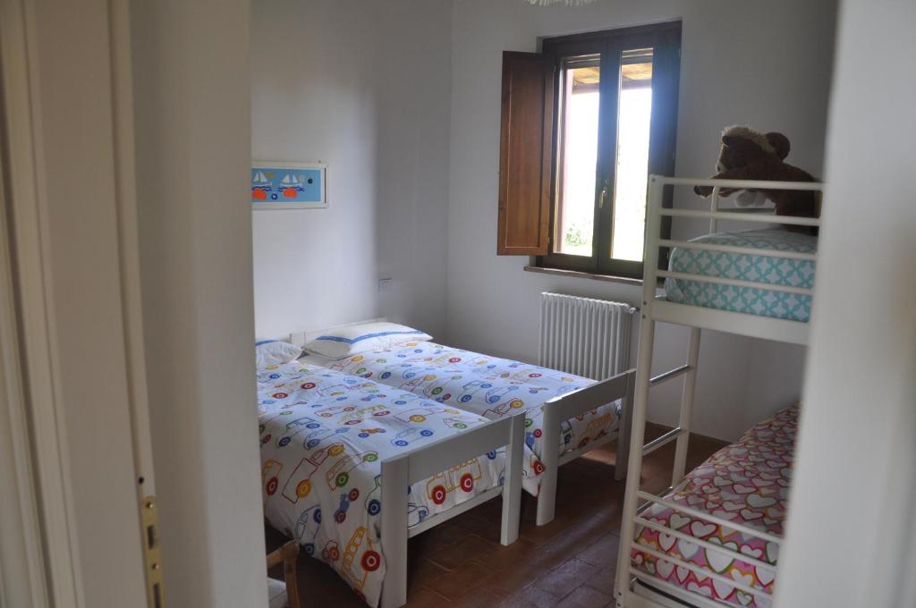 Postel nebo postele na pokoji v ubytování Stalla Lunga