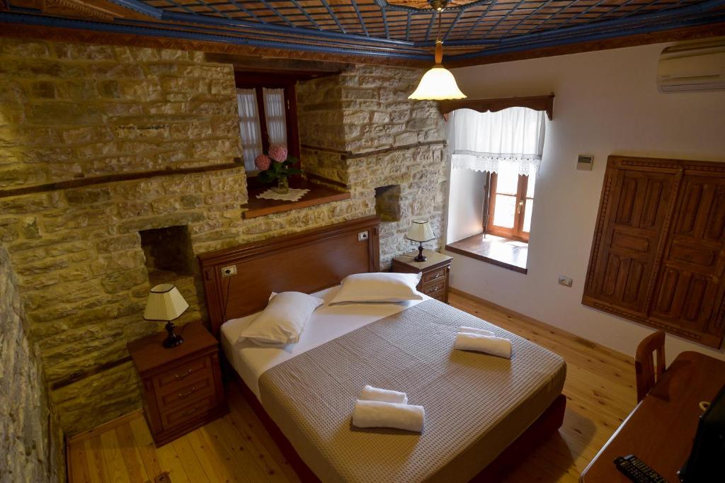 Postel nebo postele na pokoji v ubytování Hotel Kalemi 2