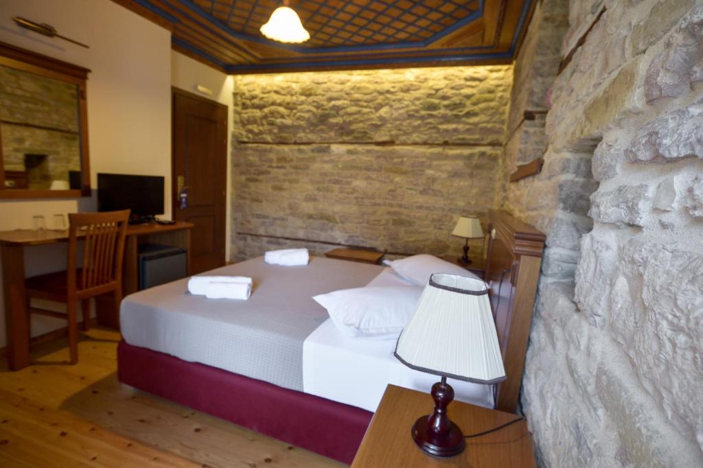 Postel nebo postele na pokoji v ubytování Hotel Kalemi 2