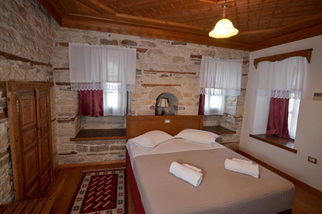 Postel nebo postele na pokoji v ubytování Hotel Kalemi 2