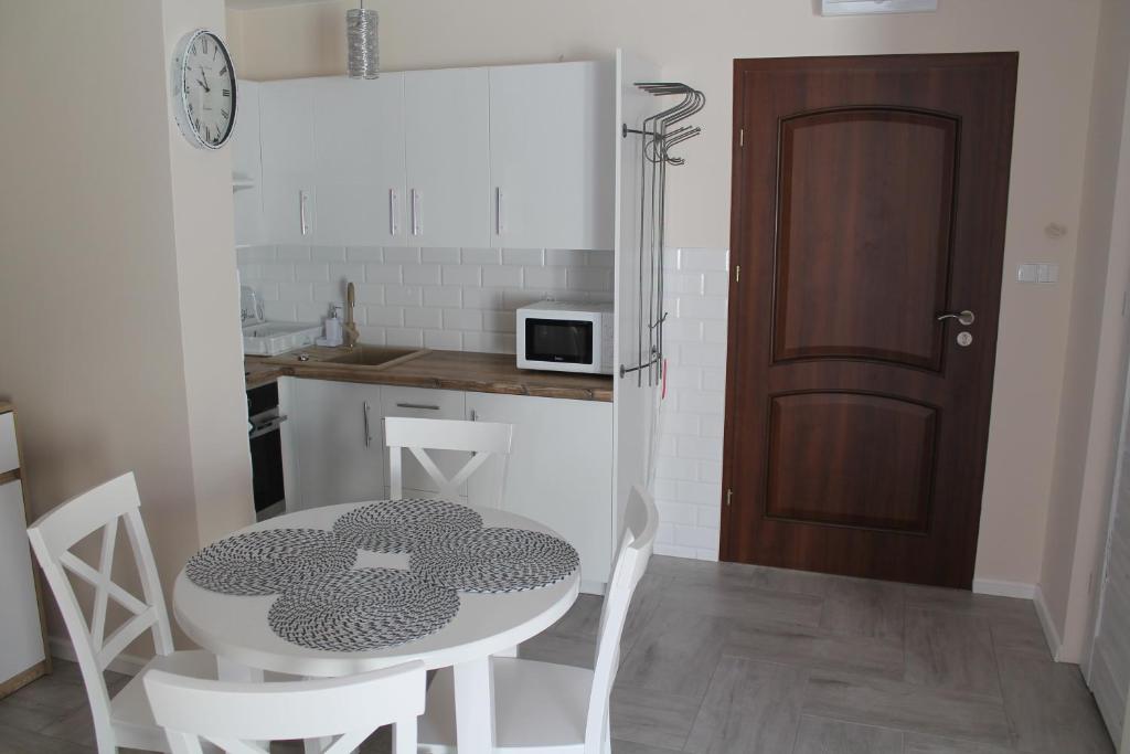 Kuchnia lub aneks kuchenny w obiekcie Apartament "Zacisze"