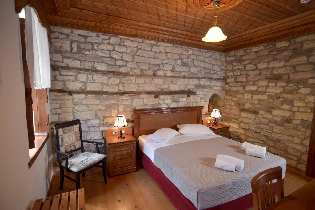 Postel nebo postele na pokoji v ubytování Hotel Kalemi 2