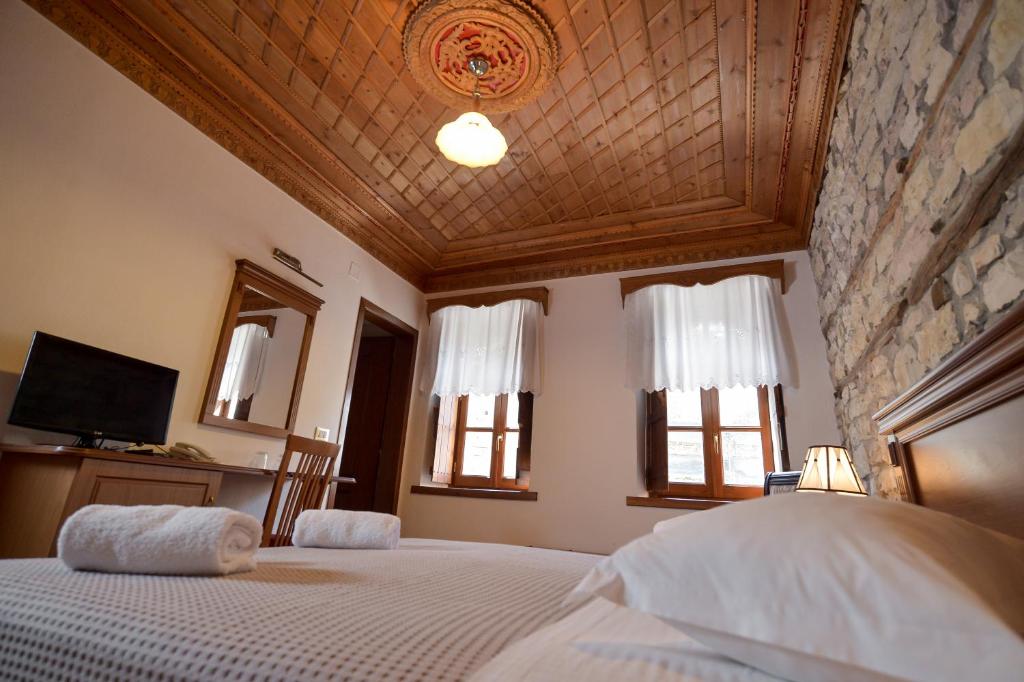 Postel nebo postele na pokoji v ubytování Hotel Kalemi 2