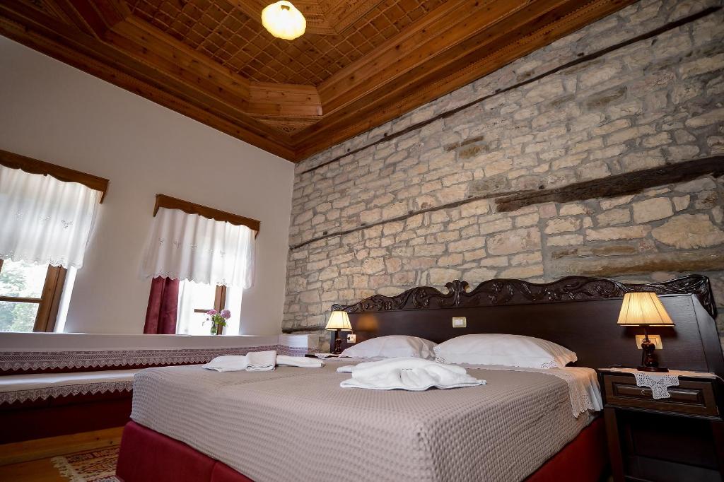 Postel nebo postele na pokoji v ubytování Hotel Kalemi 2