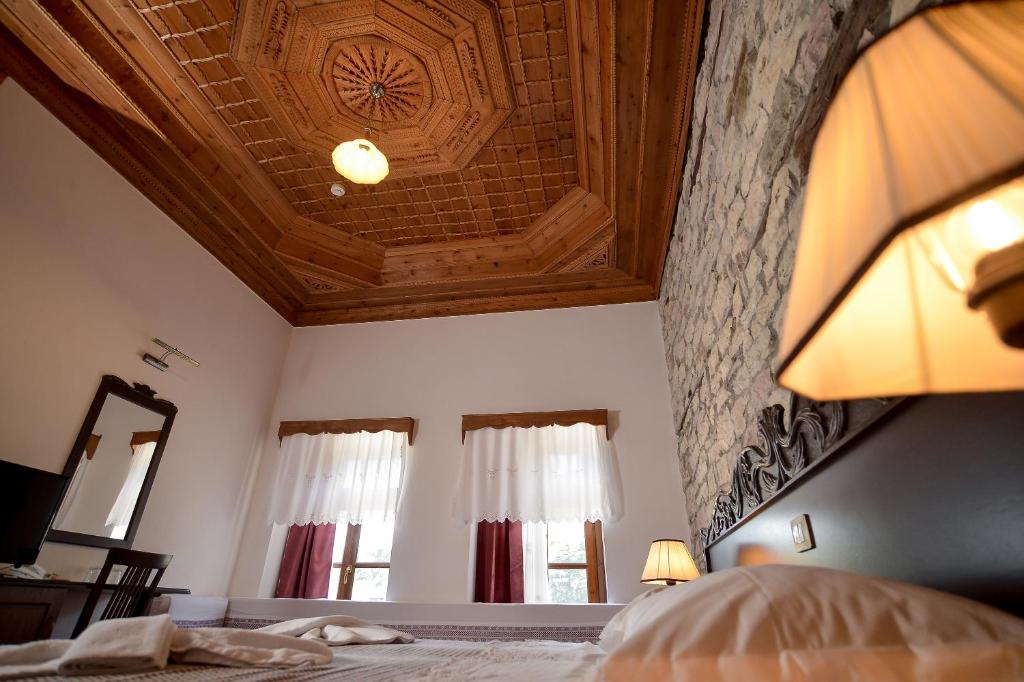 Postel nebo postele na pokoji v ubytování Hotel Kalemi 2