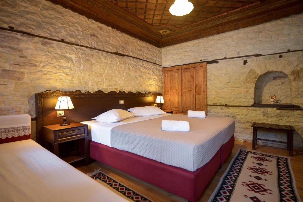 Postel nebo postele na pokoji v ubytování Hotel Kalemi 2