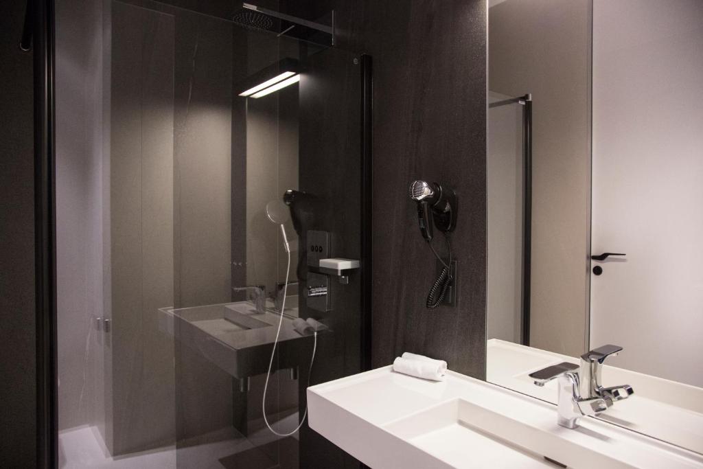 Koupelna v ubytování Hotel Nicolaus