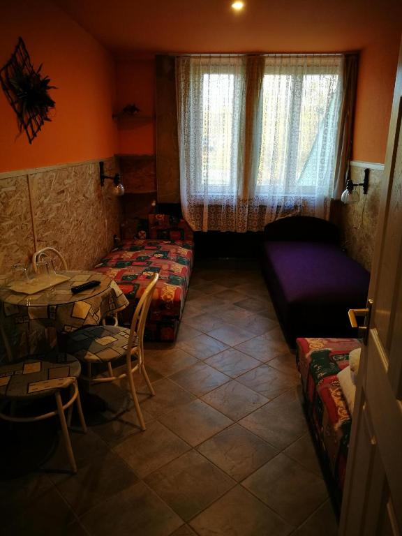 Postel nebo postele na pokoji v ubytování Páterdombi Vendégház
