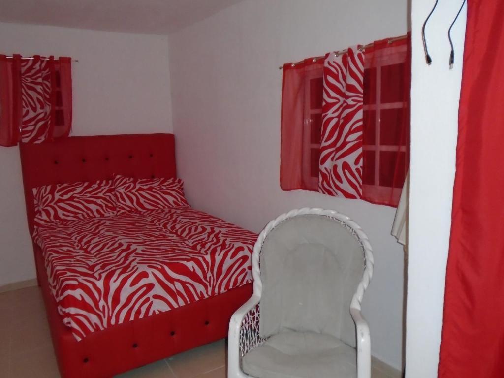 Postel nebo postele na pokoji v ubytování Guesthouse Villa La Isla