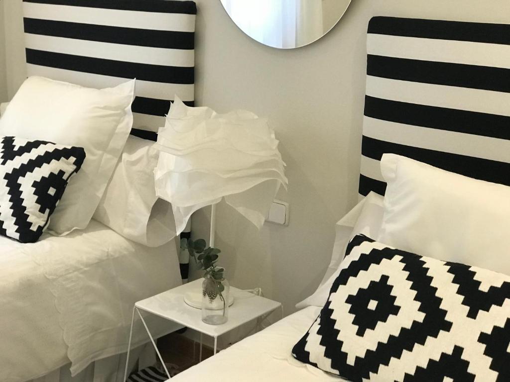 Posteľ alebo postele v izbe v ubytovaní Apartamento las doblas , parking gratis