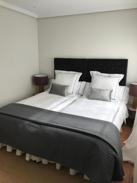 Posteľ alebo postele v izbe v ubytovaní Apartamento las doblas , parking gratis