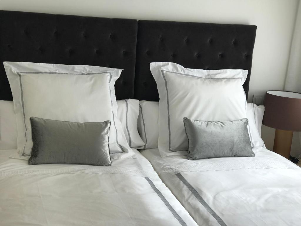 Posteľ alebo postele v izbe v ubytovaní Apartamento las doblas , parking gratis