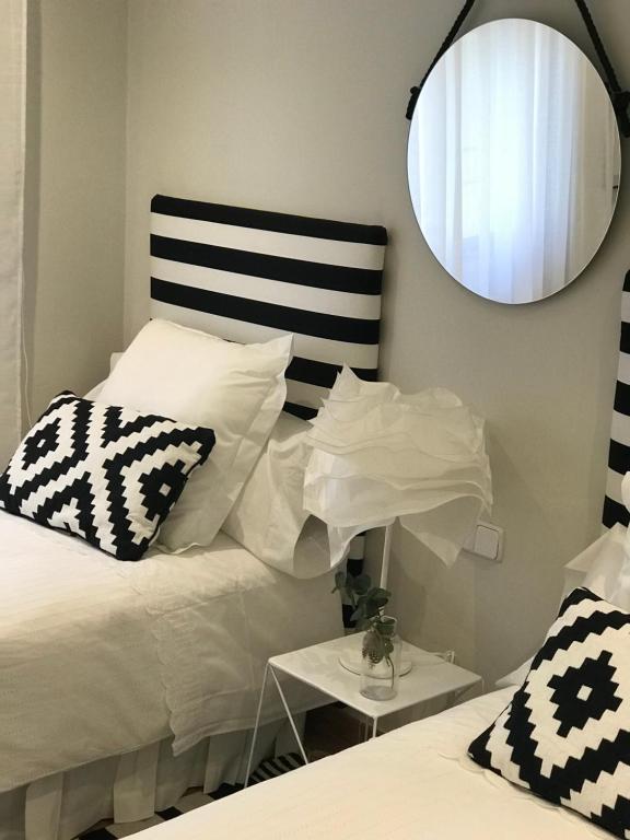 Posteľ alebo postele v izbe v ubytovaní Apartamento las doblas , parking gratis
