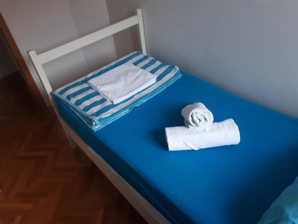Posteľ alebo postele v izbe v ubytovaní Hostel Omiš